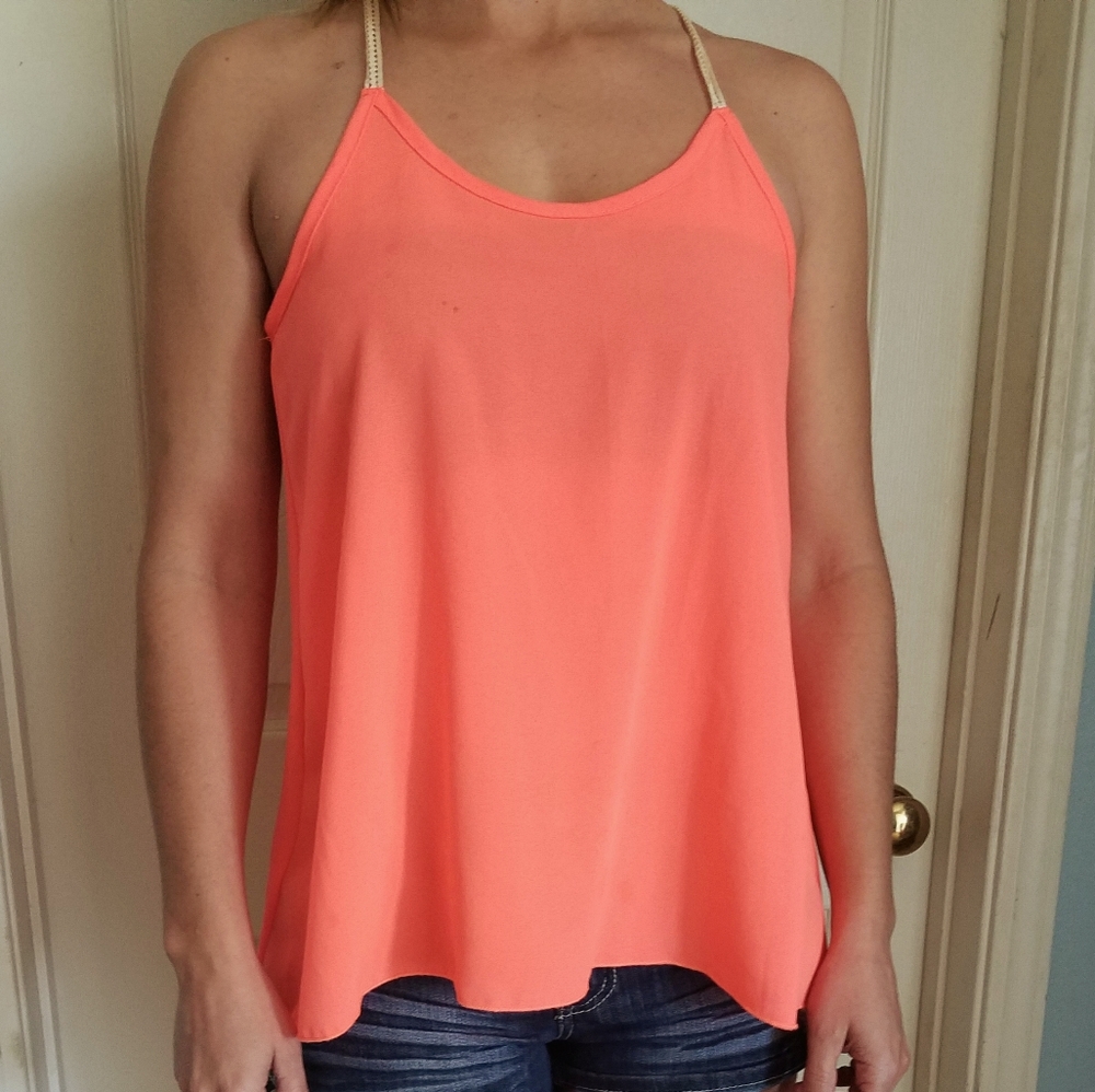 Pink top with criss-cross straps